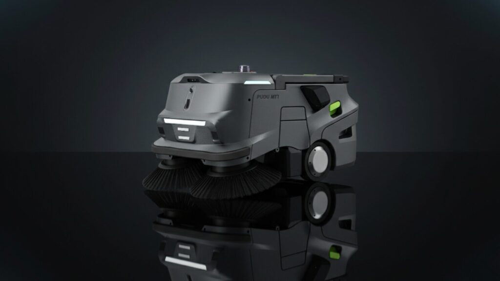 PUDU MT1 Kehrsaugroboter mit zwei Seitenbürsten auf glänzendem Boden