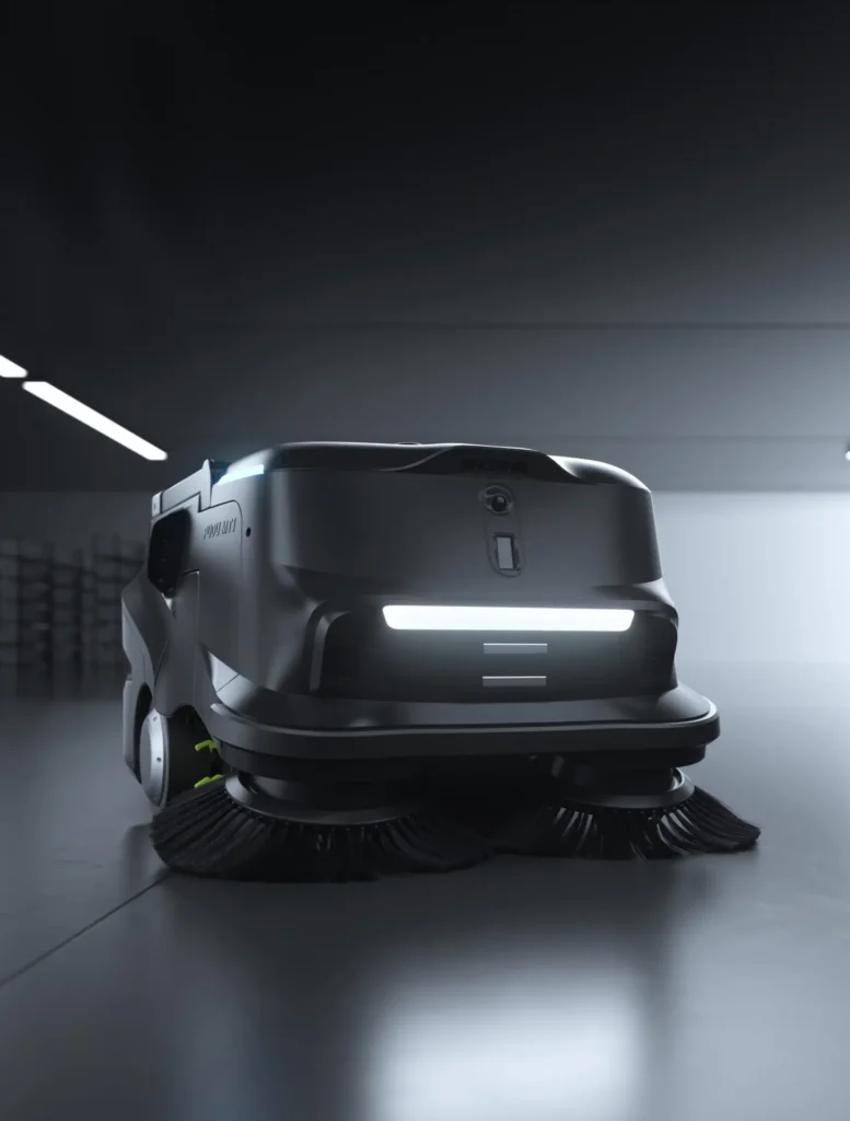 PUDU MT1 Kehrsaugmaschine mit Doppel-Seitenbürsten auf glattem Industrieboden, Front-LED aktiv